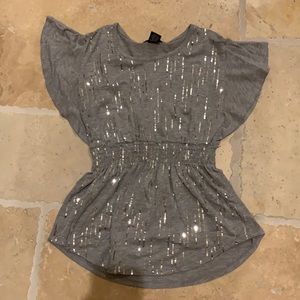 A cute gray and silver top in the brand eyeshadow girls